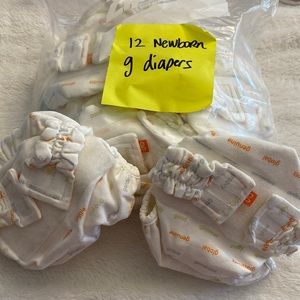 12 newborn g diaper covers, like new condition